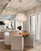 Modern Amber-White Art Glass Chandelier Over Dining Room Table