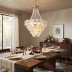 Modern Cascading Art Glass Chandelier Over Wooden Dining Table