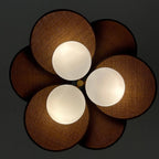Bottom Up View of Illuminated Modern Wood Petal Pendant Light