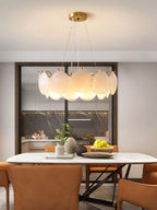 Modern Brass Shell Art Glass Chandelier in Cozy Dining Space