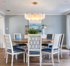 Modern Shell Art Glass Chandelier Over Round Dining Table