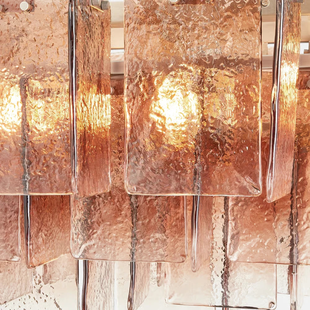 Close Up View of Pink-Amber Faceted Glass Shades and Internal Lighting