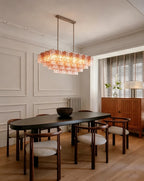 Modern Pink-Amber Faceted Glass Linear Chandelier Over Wooden Dining Table