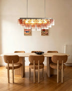 Modern Cascading Art Glass Linear Chandelier Over Dining Area