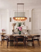 Modern Pink-Amber Faceted Glass Linear Chandelier Over Dining Room Table