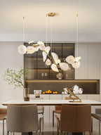 Modern White Round Plate Art Glass Linear Chandelier Over Dining Area