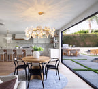 Modern White Round Plate Art Glass Chandelier Over Round Dining Table