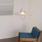 Modern White Disc Pendant Light Over Living Room Corner
