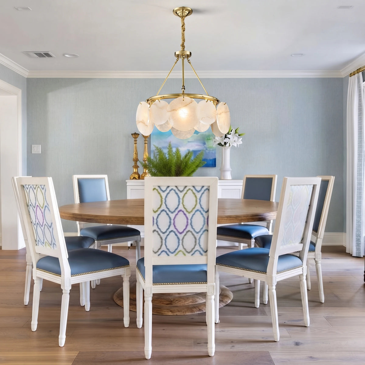 Alabaster Disc Ring Chandelier Over Round Dining Table