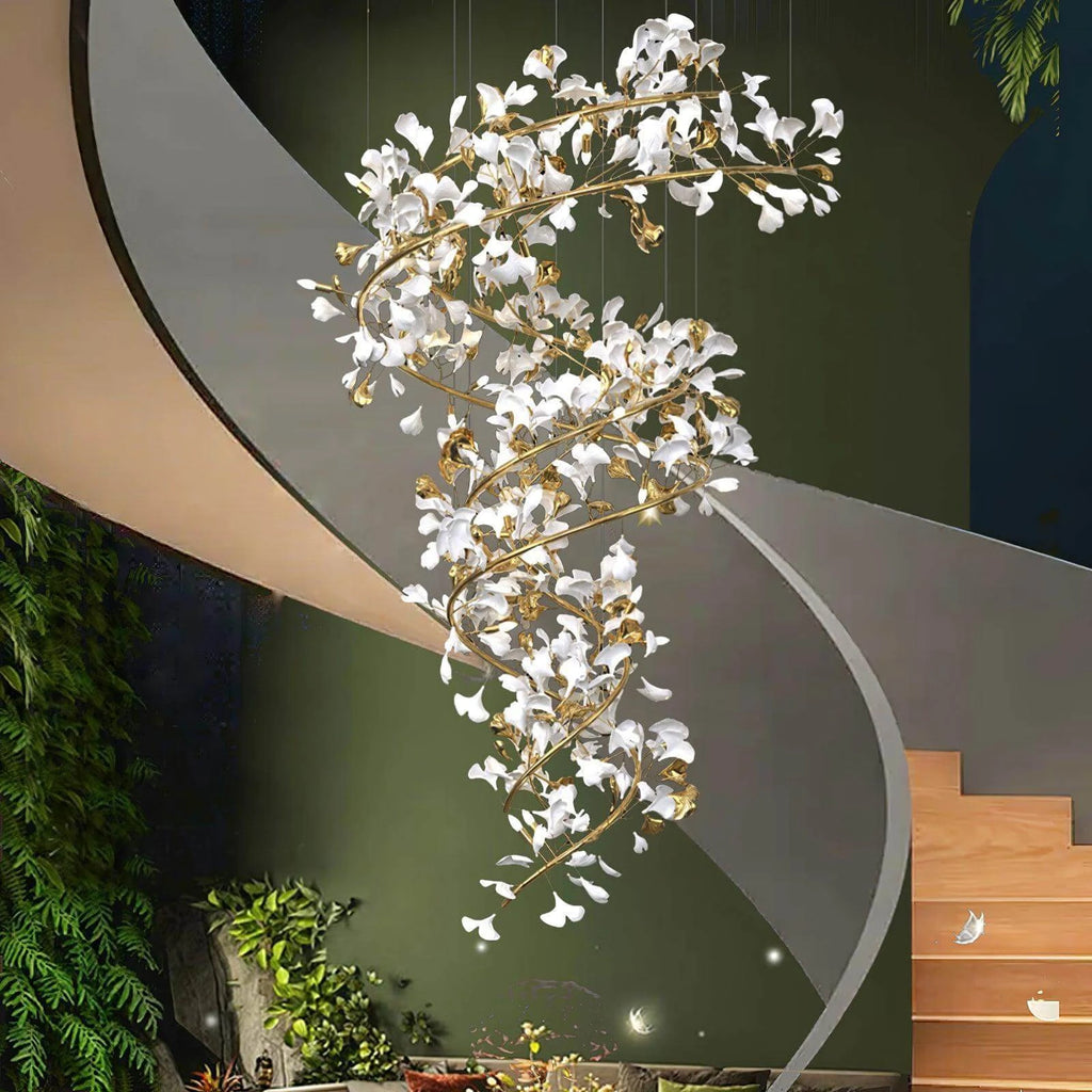 Modern Grand Spiral Chandelier Along Curved Staircase
