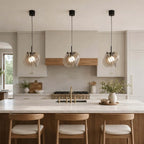 Modern Brass Layered Wave Disc Pendant Lights Over Kitchen Island