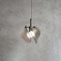 Illuminated Modern Smoked Grey Layered Wave Disc Art Glass Pendant Light Studio Shot