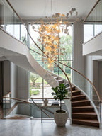 Modern Gold Branch Chandelier in Spacious Architectural Foyer