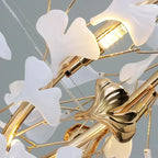 Close Up View of Illuminated Gold Ginkgo Leaf Chandelier Studio Display