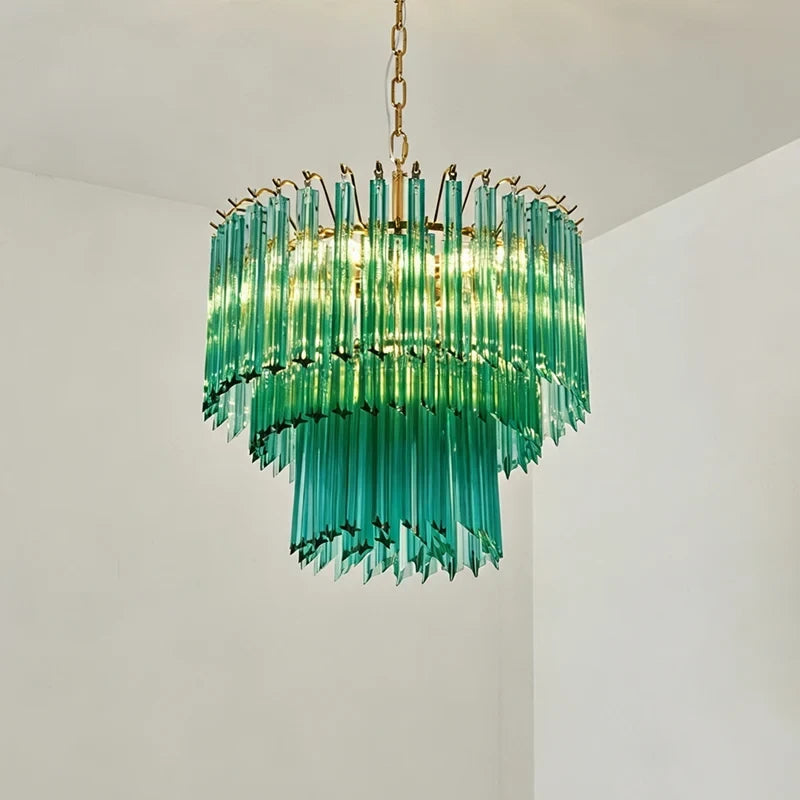 Upward View of Illuminated Modern Teal Fluted Art Glass Chandelier Studio Shot