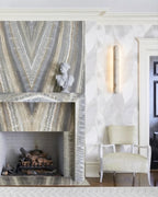 Modern Art Glass Wall Sconce Over Fireplace Setting