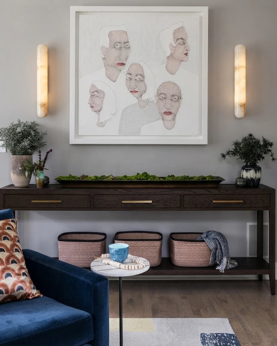 Modern Cylindrical Alabaster Wall Sconces Over Hallway Console Table