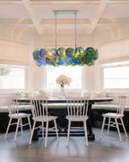 Modern Colorful Disc Art Glass Linear Chandelier in High Ceiling Interior