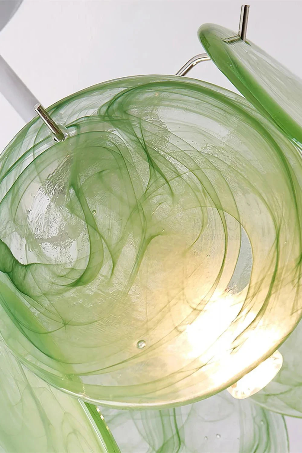 Close Up View of Illuminated Green Colorful Disc Ceiling Light