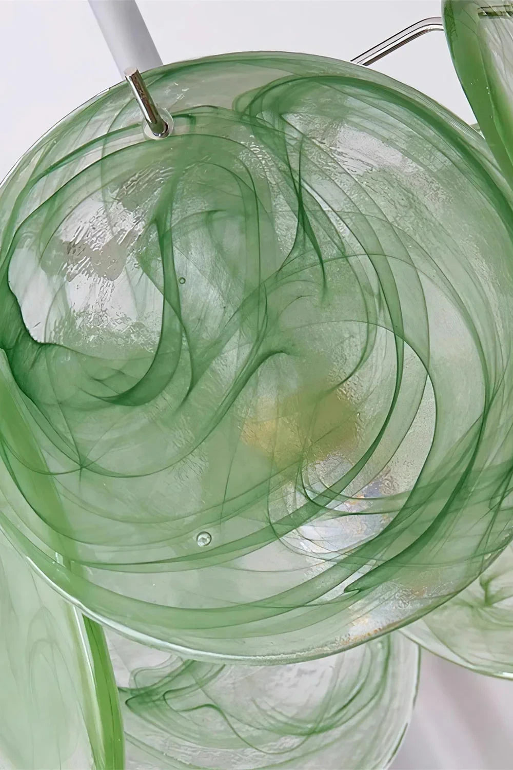 Close Up View of Green Colorful Disc Glass Texture and Light Pattern
