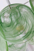 Close Up View of Green Colorful Disc Glass Texture and Light Pattern
