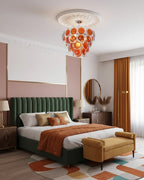 Modern Orange Gradient Disc Chandelier in Master Bedroom Setting