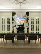 Modern Gradient Disc Art Glass Chandelier in Elegant Dining Space