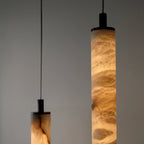 Illuminated Modern Cylindrical Alabaster Pendant Lights Studio Display