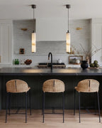 Modern Cylindrical Alabaster Pendant Lights Over Kitchen Island