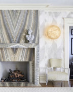 Modern Art Glass Wall Sconce Over Fireplace Setting