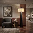 Black Tapered Base Floor Lamp Over Living Room Seating Area