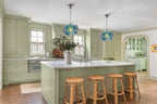 Modern Colorful Disc Art Glass Pendant Light Over Kitchen Island