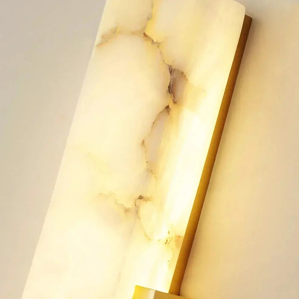 Detail View of Illuminated Alabaster Stone Veins and Brass Hardware