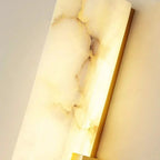 Detail View of Illuminated Alabaster Stone Veins and Brass Hardware