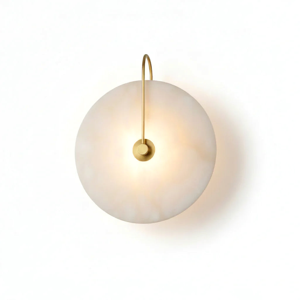 Alabaster Disc Wall Sconce round natural veined alabaster wall lamp curved brass fixture isolated white background