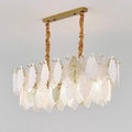 Illuminated Modern Brass Leaf Art Glass Linear Chandelier Studio Shot on Pure White Background
