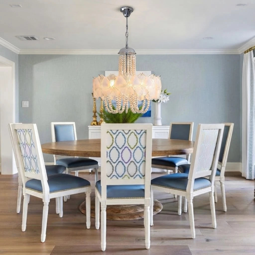 Modern White Flower Chandelier Over Round Dining Table