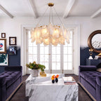 Modern Brass Frosted White Feather Chandelier with Pearl Strand in Contemporary Living Space