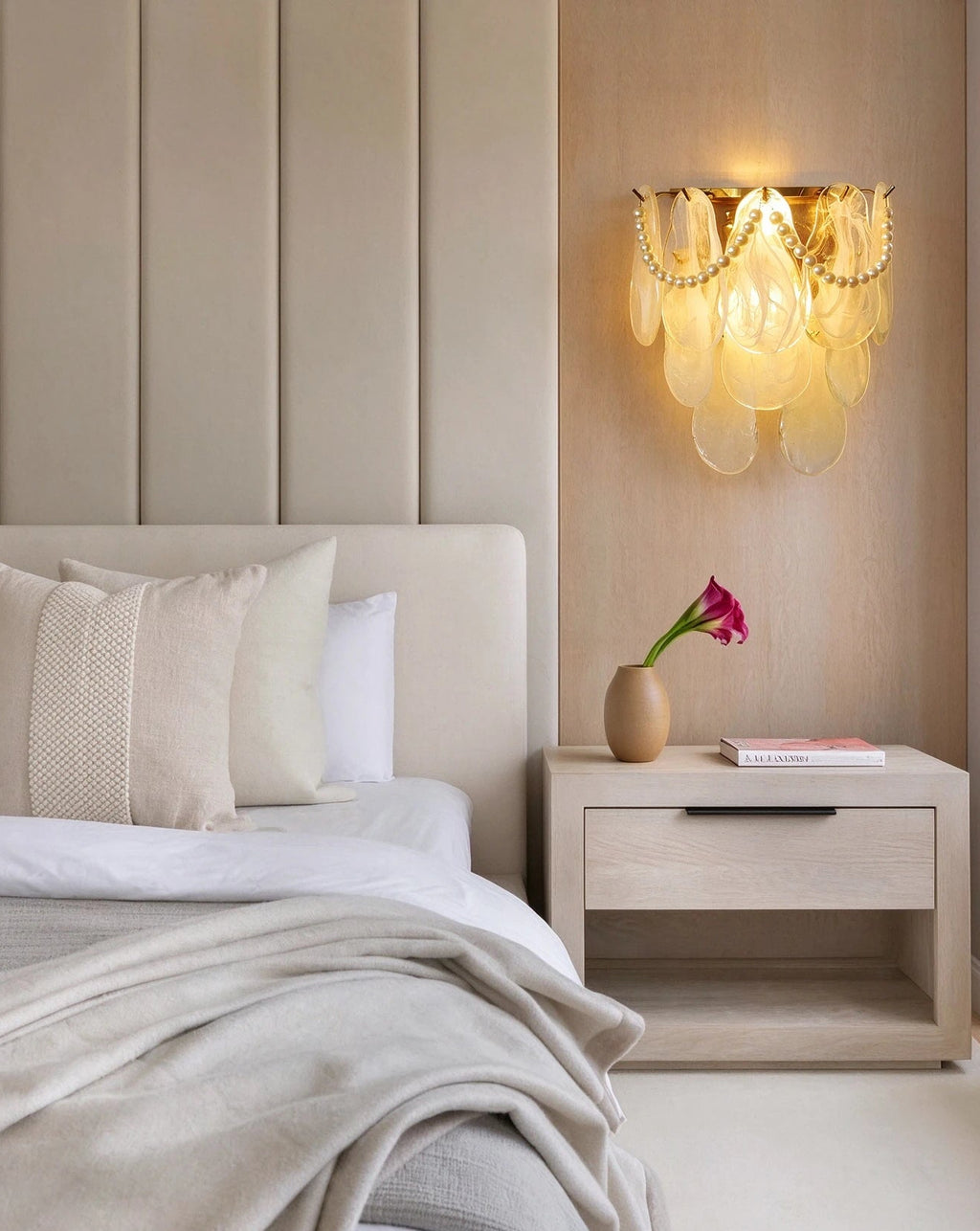 Modern Brass Pearl Oval Art Glass Wall Sconce in Cozy Bedroom Setting