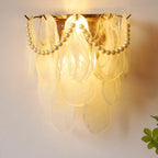 Illuminated Modern Pearl Oval Art Glass Wall Sconce Studio Shot
