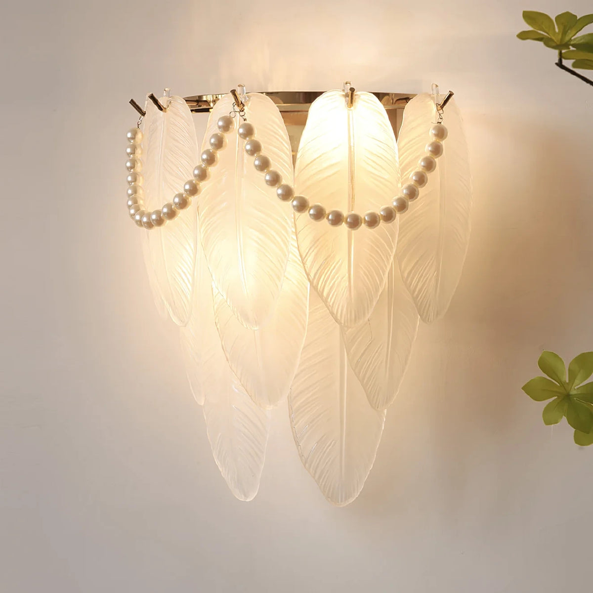 Illuminated Modern Brass Frosted White Feather Wave Art Glass Wall Sconce with Pearl Strand Studio Shot