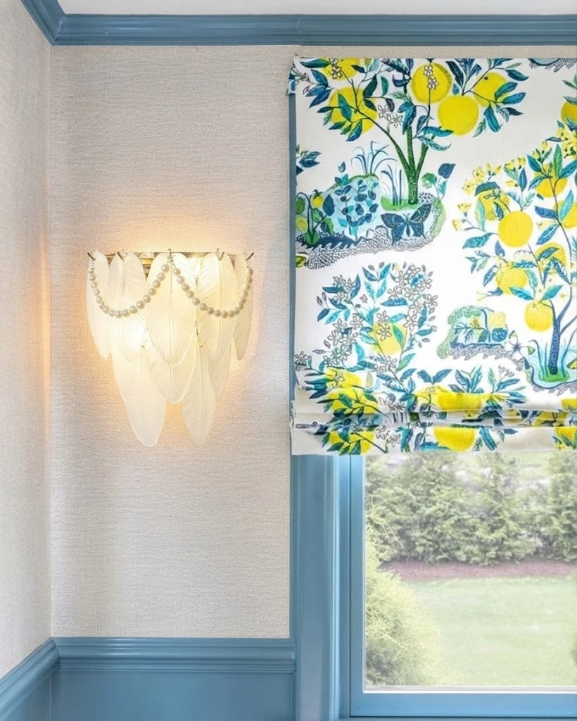 Modern Brass Frosted White Feather Wall Sconce with Pearl Strand in Stylish Sitting Area