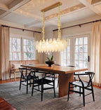 Modern Brass Frosted White Feather Chandelier with Pearl Strand in Formal Dining Room