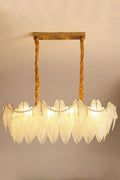 Illuminated Modern Brass Frosted White Feather Wave Art Glass Linear Chandelier with Pearl Strand Studio Shot