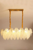 Illuminated Modern Brass Frosted White Feather Wave Art Glass Linear Chandelier with Pearl Strand Studio Shot