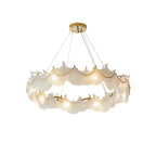 Modern Brass and Frosted White Feather Wave Art Glass Chandelier with Pearl Strand and Gold Canopy on Pure White Background