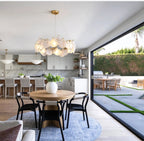 Modern Brass Frosted White Feather Chandelier with Pearl Strand in Open Plan Kitchen Dining