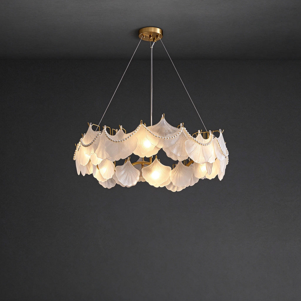 Illuminated Modern Frosted White Feather Wave Chandelier with Pearl Strand Studio Display on Black Background