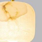 Close Up View of Illuminated Alabaster Shade Bottom and Natural Stone Veins