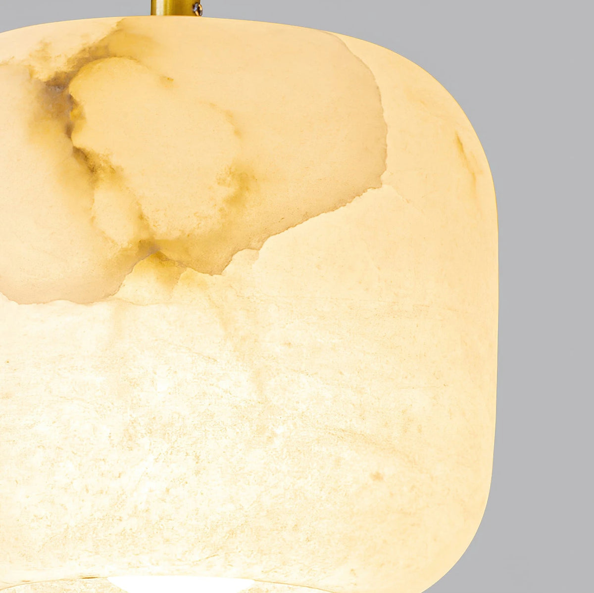 Close Up View of Illuminated Alabaster Shade Bottom and Natural Stone Veins